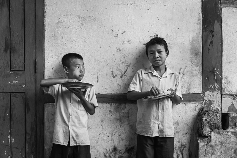 Kachin children fleeing from their village located just 25 kilometres from Saint Paul IDP camp, Namti, Mogaung township, Mohnyin district, Kachin state, Myanmar. September 2019