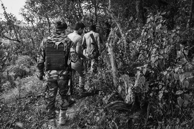 Chin National Defence Force on the front line against a Myanmar military base located in the mountains, Falam township, Chin state, Myanmar. November 2022