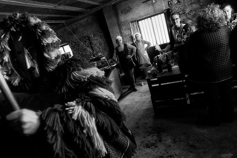 A “Careto” greets a villager, Macedo de Cavaleiros municipality, Bragança district, Trás-os-Montes region, Portugal