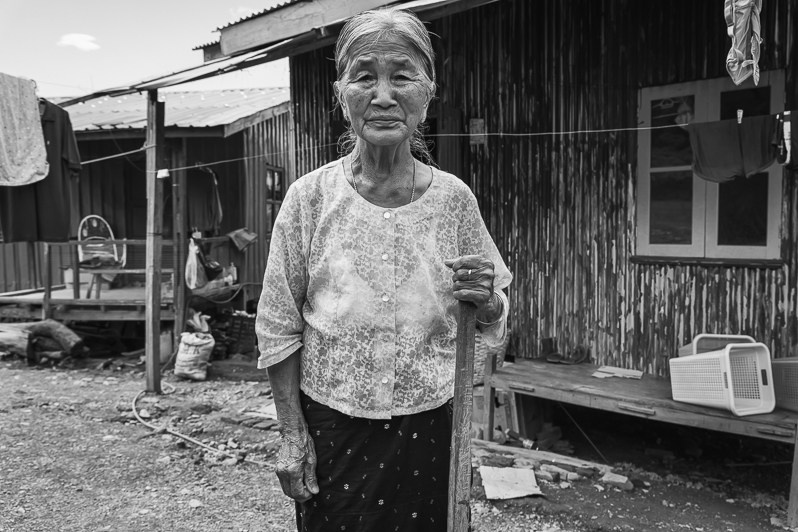 Dar Lang 85 years old, IDP from Thantlang in September 2021 when the town was under fierce bombing and destroyed, Fanthem village, Lautu region, Burma. September 2022