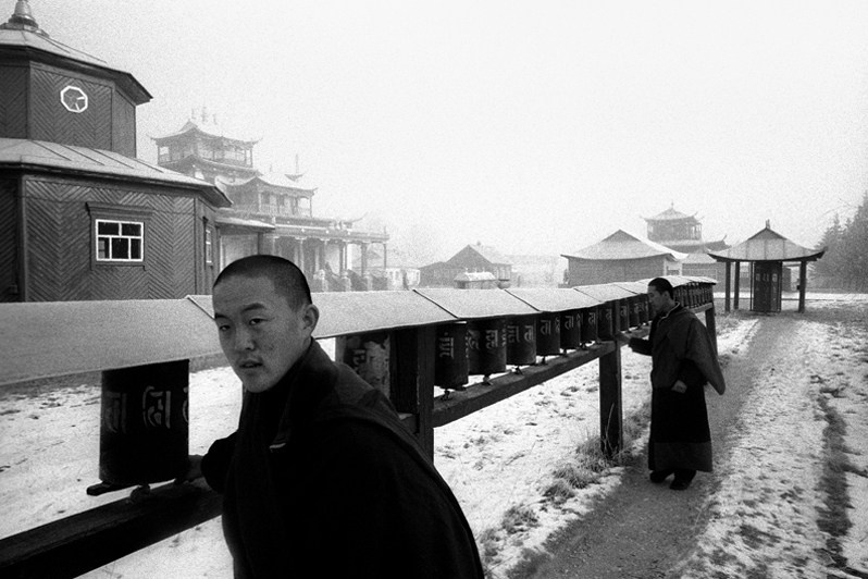 Prayer walk, performed by Buddhist monks, three to five times during the day, Verkhnyaya Ivolga village, Buryatia, Russia. November 2001