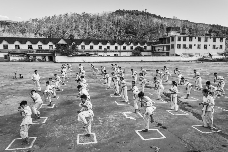 Kachin youth practising martial arts part daily self defense and sports activities, Laiza township, Myitkyina district, Kachin state, Myanmar. April 2019