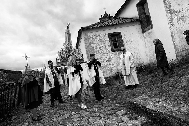 People prepare to start a procession in honor of Nossa Senhora de Fátima, Bragança district, Trás-os-Montes region, Portugal. 2016