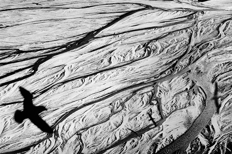 Birds hovering over the outwash plain Myrdalssandur, Greenland, Kingdom of Denmark. 1996