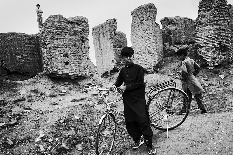 Children playing on the ruins of the Ghazni Citadel, Ghazni, Afghanistan. 2024