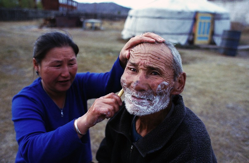 Outdoor shaving, Khatgal village, Khövsgöl province, Mongolia. September 2011