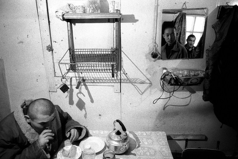Student breakfast in the canteen, Verkhnyaya Ivolga village, Buryatia, Russia. November 2001