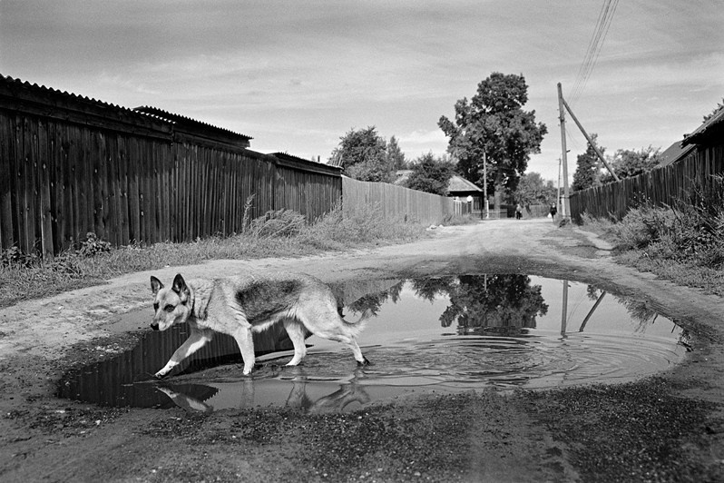 Through the puddle, Yurino urban-type settlement, Mari El Republic, Russia. 2013