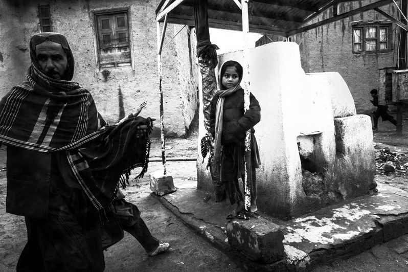 Afghans in Pashtuns – traditional costumes and sholi – shawls for insulation, Ghazni, Afghanistan. 2024