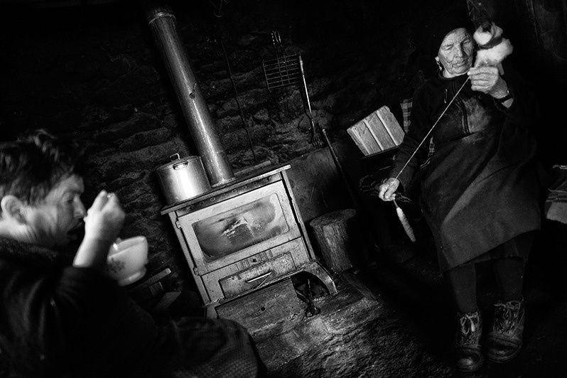 Woman spinning wool by hand, Boticas municipality, Vila Real district, Trás-os-Montes region, Portugal. 2017