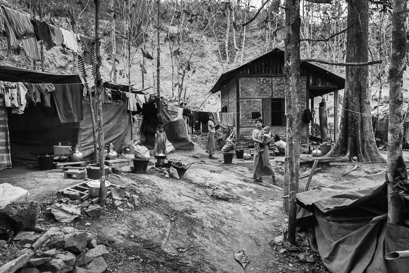 Precarious shelters set up on monastery owned land, Lahakaiza Monastery IDP camp, Mrauk-Oo, Rakhine state, Myanmar. February 2020