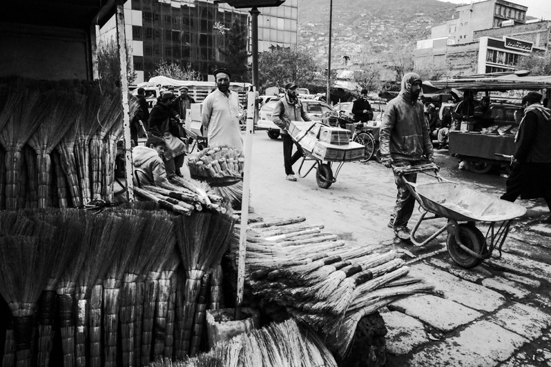 All goods are carried in wheelbarrows, on carts, on donkeys, Kabul, Afghanistan. 2024