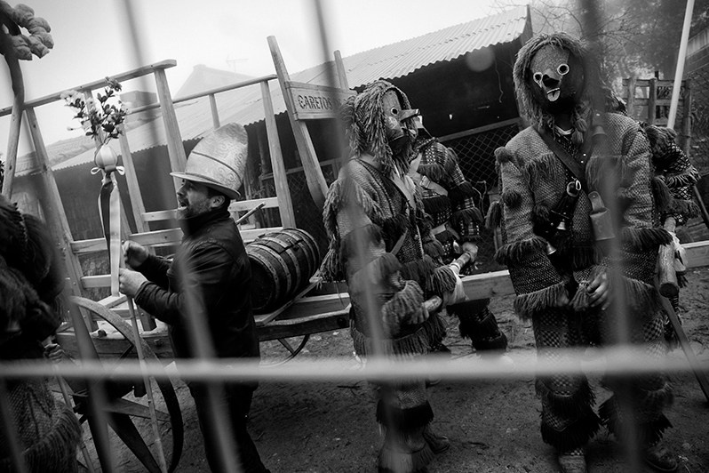 The “Bispo” accompanied by the “Caretos” during the “Ronda”, Bragança municipality, Bragança district, Trás-os-Montes region, Portugal. 2019