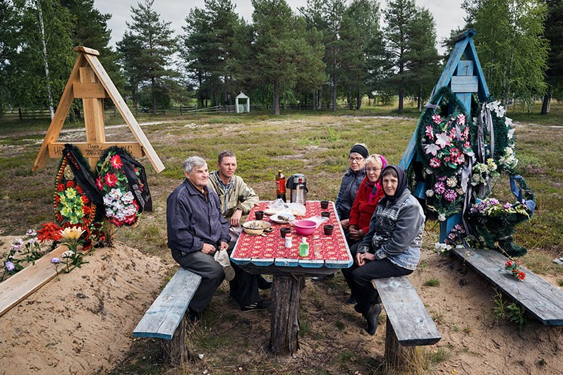 Wake in the cemetery of the village of Bolshaya Puchkoma, Udorsky district, Komi Republic, Russia. 2020