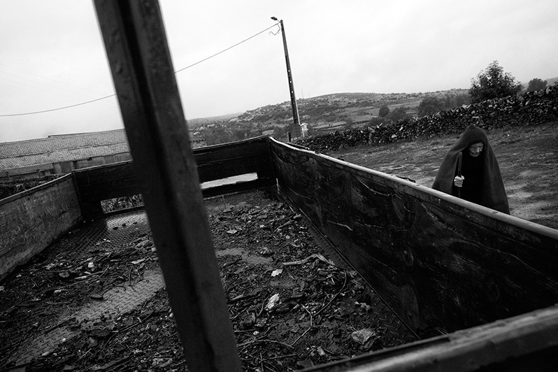 Woman going about her village business, Boticas municipality, Vila Real district, Trás-os-Montes region, Portugal. 2017