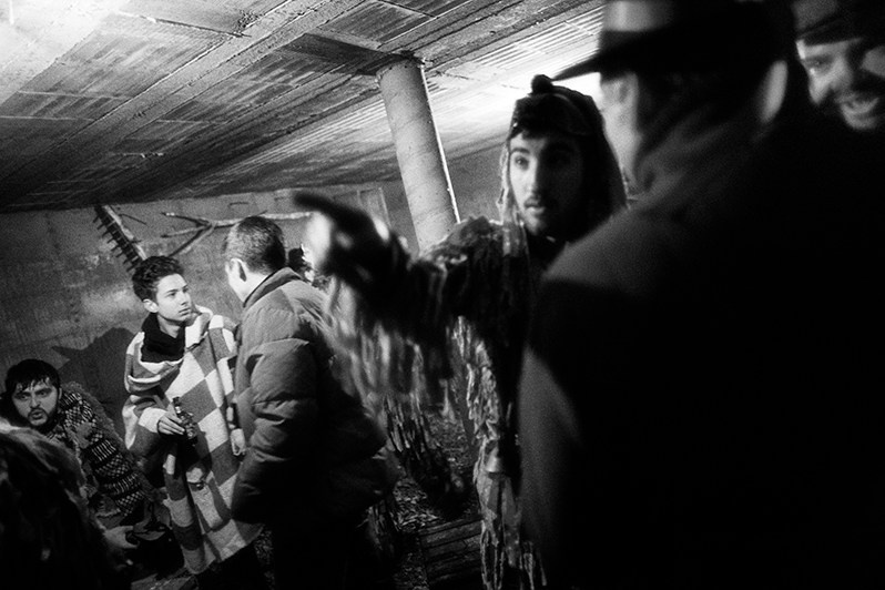 “Mordomos” and “Caretos” inside a wine cellar during “Ronda”, Bragança municipality, Bragança district, Trás-os-Montes region, Portugal. 2020