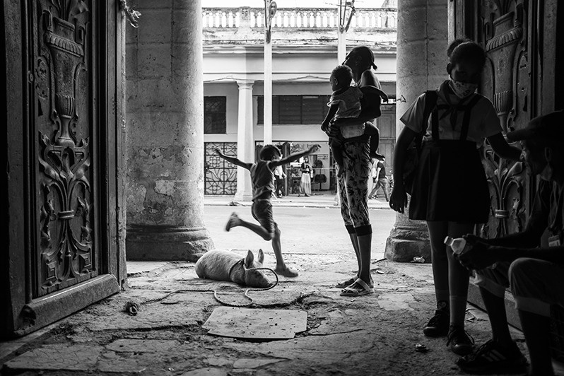 Everyday life in an apartment block on one of the capital's busiest streets, Monte, Centro Habana district, Havana, Cuba. 2021