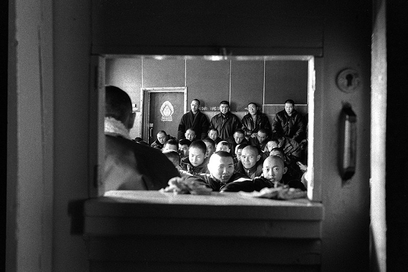 Buddhist monks learning Tibetan language, Verkhnyaya Ivolga village, Buryatia, Russia. November 2001