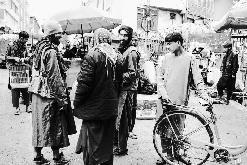 Locals discuss the latest news, Kabul, Afghanistan. 2024