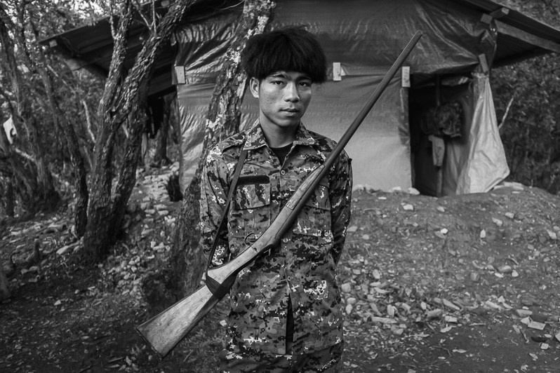 Chin combattant part of the Chin Defence Force in a mountain hide-out in an undisclosed area in Lautu, Chin State, Myanmar. September 2022