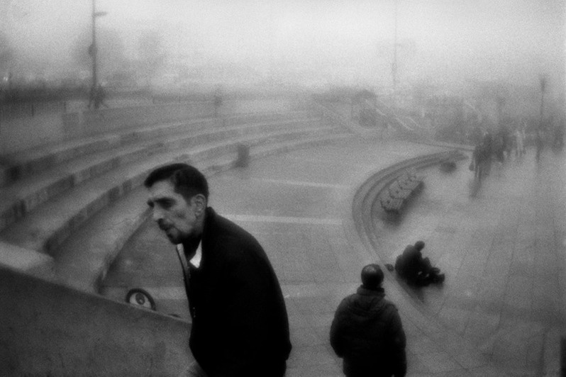 Morning fog in the square of the New Mosque, Yeni Cami meydanı, Eminönü district, Istanbul, Turkey. January 2013
