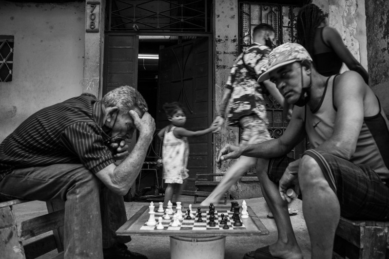 Chess Party on Aguila street, Centro Habana district, Havana, Cuba. 2022