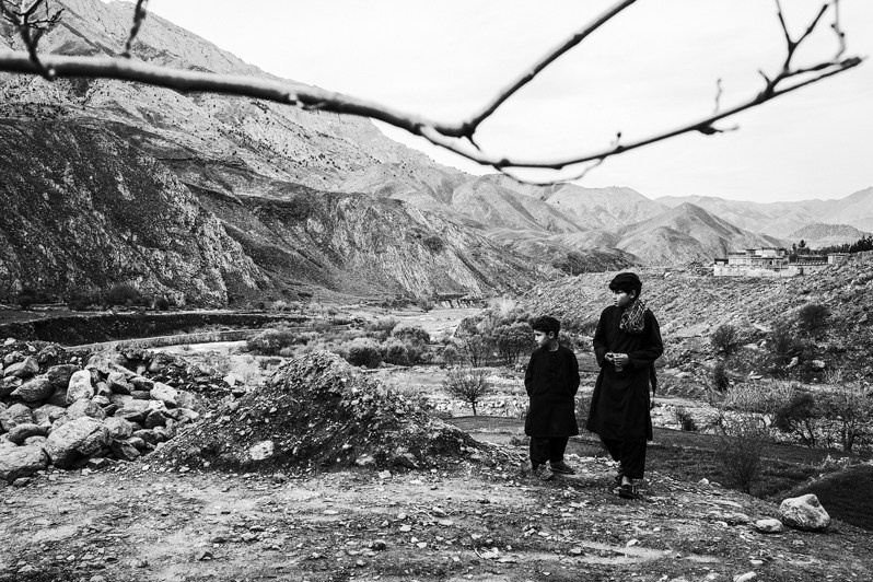 Children standing on the road in Panjshir Valley, Afghanistan. 2024