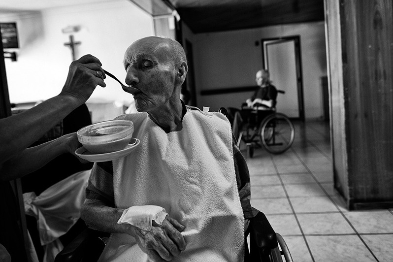 Breakfast at the nursing home, Bragança district, Trás-os-Montes region, Portugal. 2015