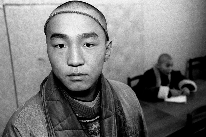 Portrait of a student of the Ivolginsky Datsan Buddhist Training Centre, Verkhnyaya Ivolga village, Buryatia, Russia. November 2001