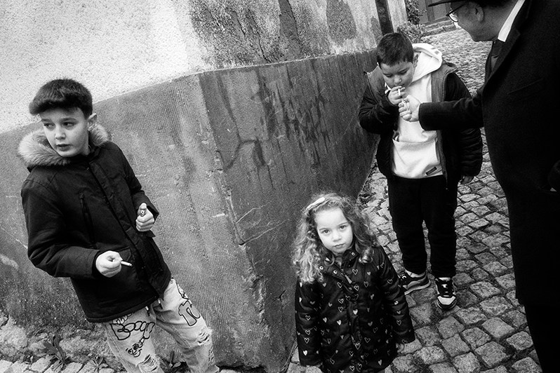 On this village's festival day, children are allowed by their parents to smoke as they believe this is part of the rites of passage, Mirandela municipality, Bragança district, Trás-os-Montes region, Portugal. 2023