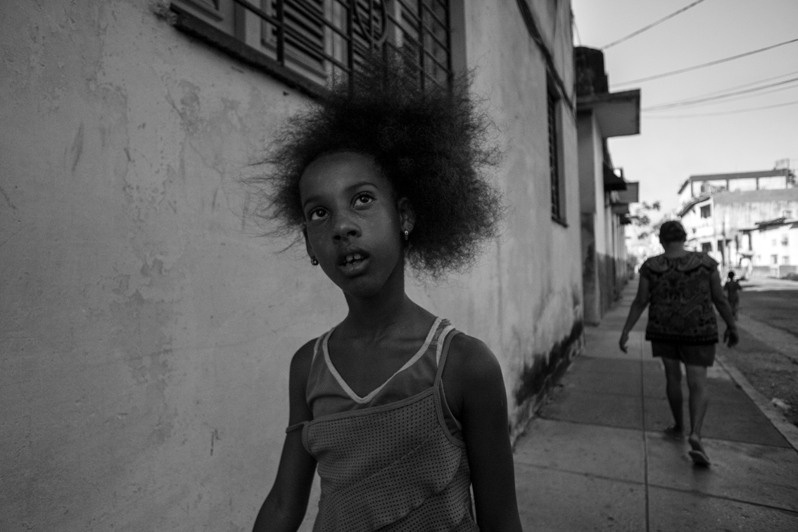 Instant portrait of the girl, Centro Habana district, Havana, Cuba. 2017