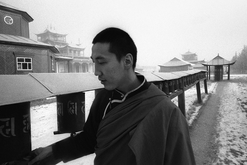 The prayer circle, about 1500 metres long, is carried out within the perimeter of the Ivolginsky Datsan, Verkhnyaya Ivolga village, Buryatia, Russia. November 2001