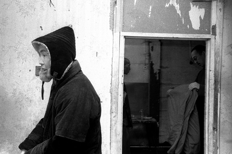 The atmosphere of the community housed in the Ivolginsky Datsan Buddhist Centre, Verkhnyaya Ivolga village, Buryatia, Russia. November 2001