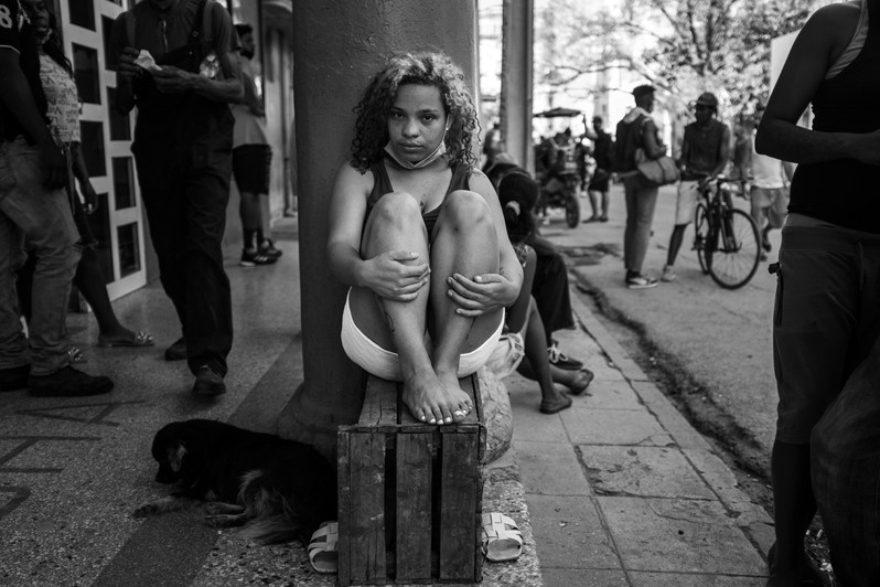 Portrait of a girl on Aguila street, one of the streets with the largest underground trade in the centre of Havana, Centro Habana district, Havana, Cuba. 2022