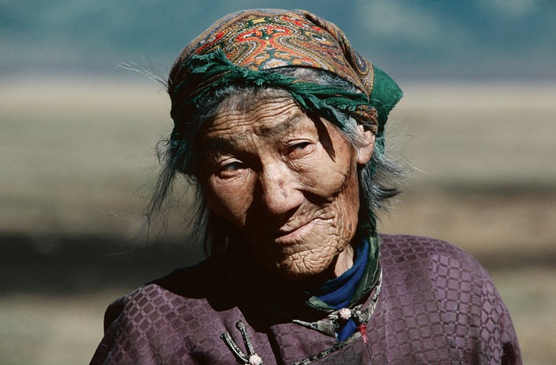 92 years old lady with blue eyes living alone far from anywhere, Khövsgöl province, Mongolia. September 2006