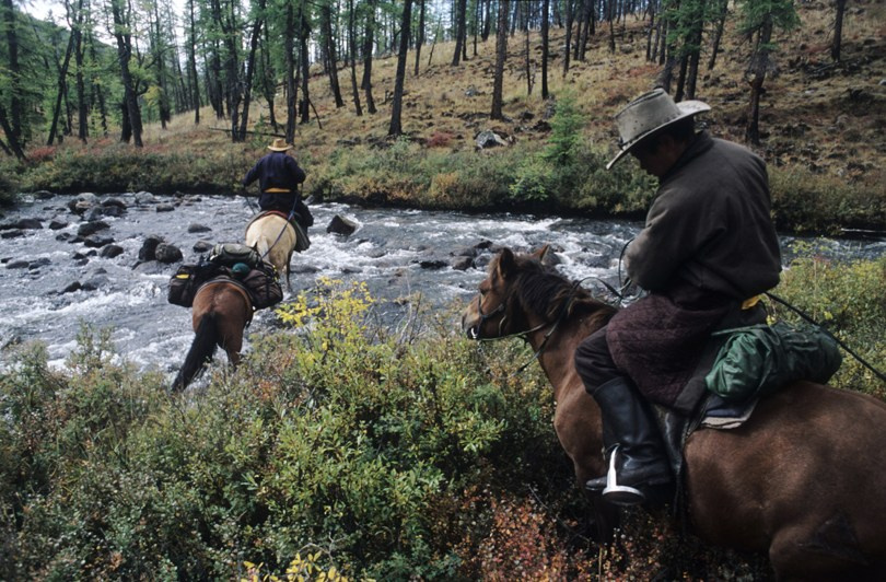 Crossing one of the countless rivers, Ulaan Taiga mountains, Khövsgöl province, Mongolia. September 2012