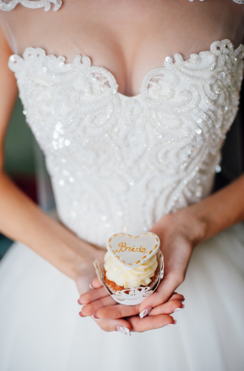 Happy wedding in the pouring rain. Elegant Wedding Photography