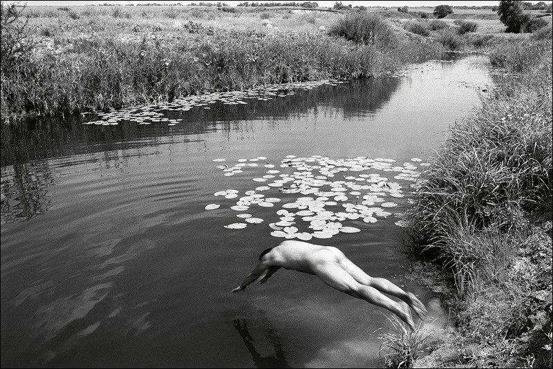 "Jump in a river creek", near farm of Senshin, village of Oblivskaya district, Rostov-on-Don region, Russia, July 2010