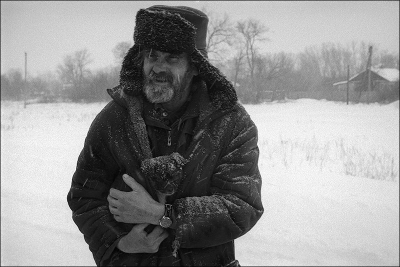"Puppy in the bosom", farm of Bykovsky, Verhnedonsk district, Rostov-on-Don region, Russia, February 2012