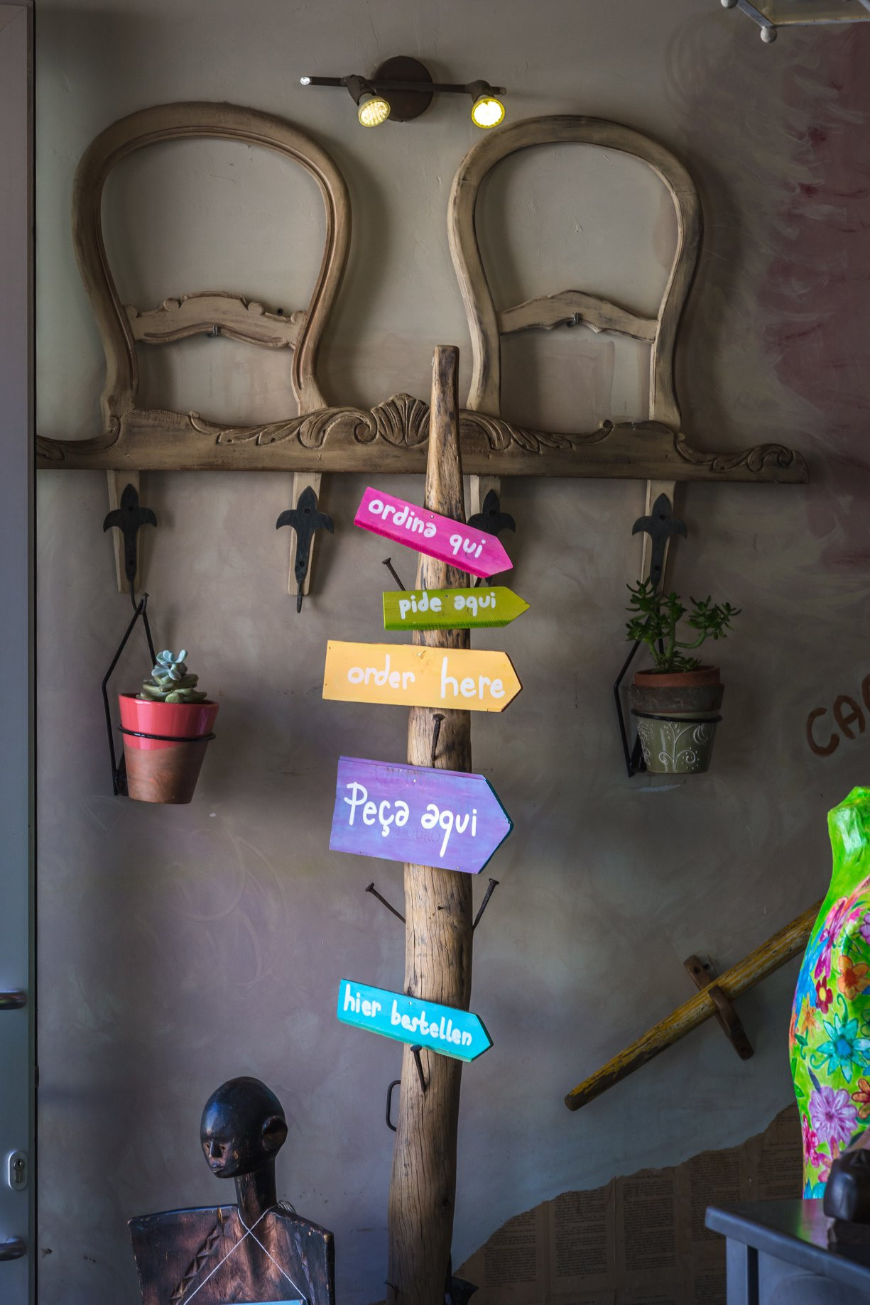 Photographs of the vegan restaurant House of Wonders in Cascais. Garden and interior photographer Elena Shavlovska, Netherlands