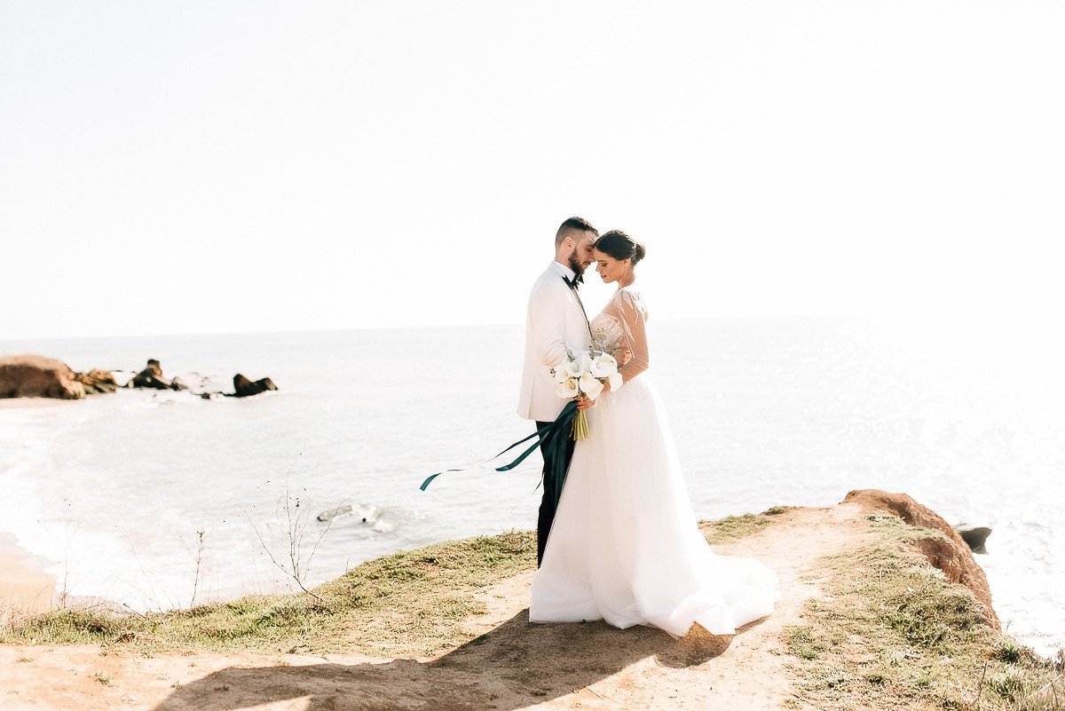 Свадебная церемония на берегу моря. Весільний та сімейний фотограф у Запоріжжі Юлія Васьків