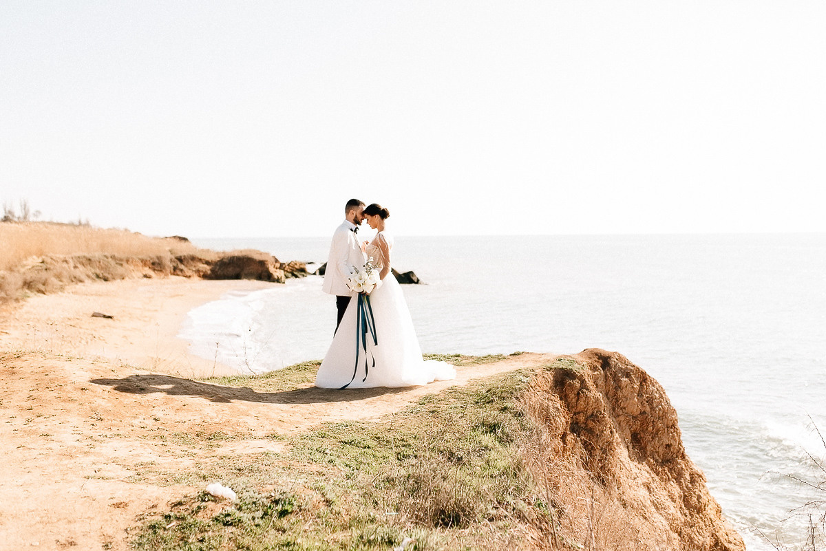Свадебная церемония на берегу моря. Весільний та сімейний фотограф у Запоріжжі Юлія Васьків