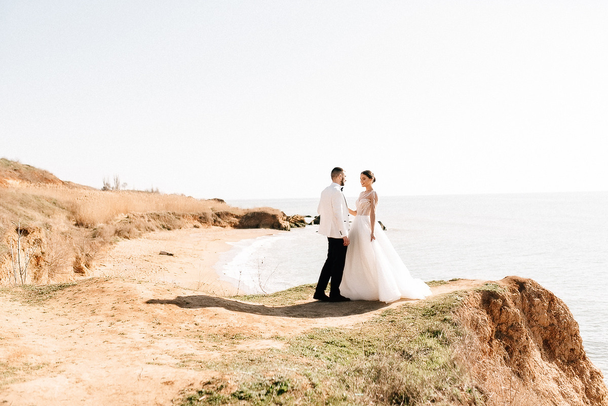 Свадебная церемония на берегу моря. Весільний та сімейний фотограф у Запоріжжі Юлія Васьків
