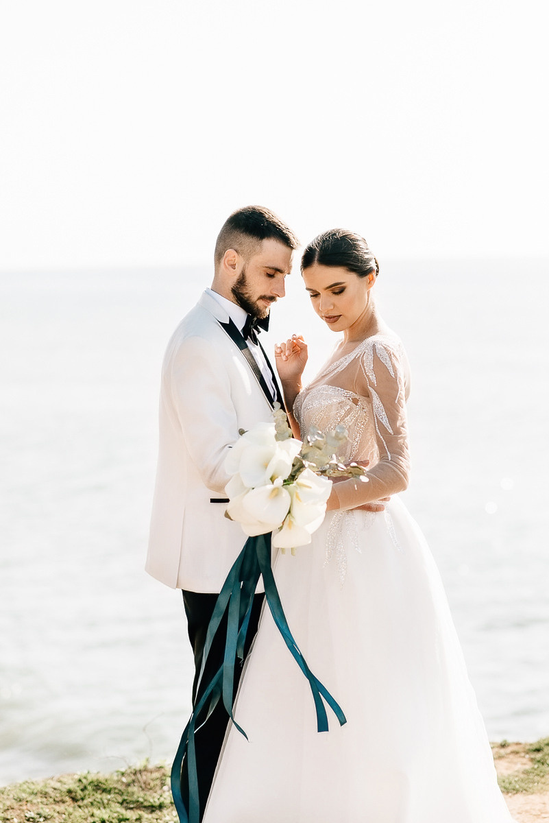 Свадебная церемония на берегу моря. Весільний та сімейний фотограф у Запоріжжі Юлія Васьків