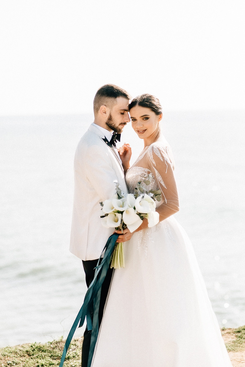 Свадебная церемония на берегу моря. Весільний та сімейний фотограф у Запоріжжі Юлія Васьків