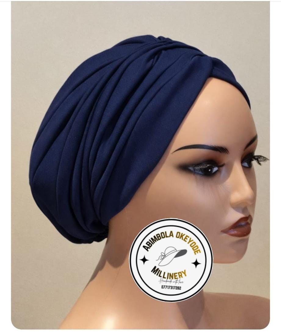 Pleated turbancap with a matching fabric band attached from behind. A milliner in Hull, UK Abimbola Okeyode