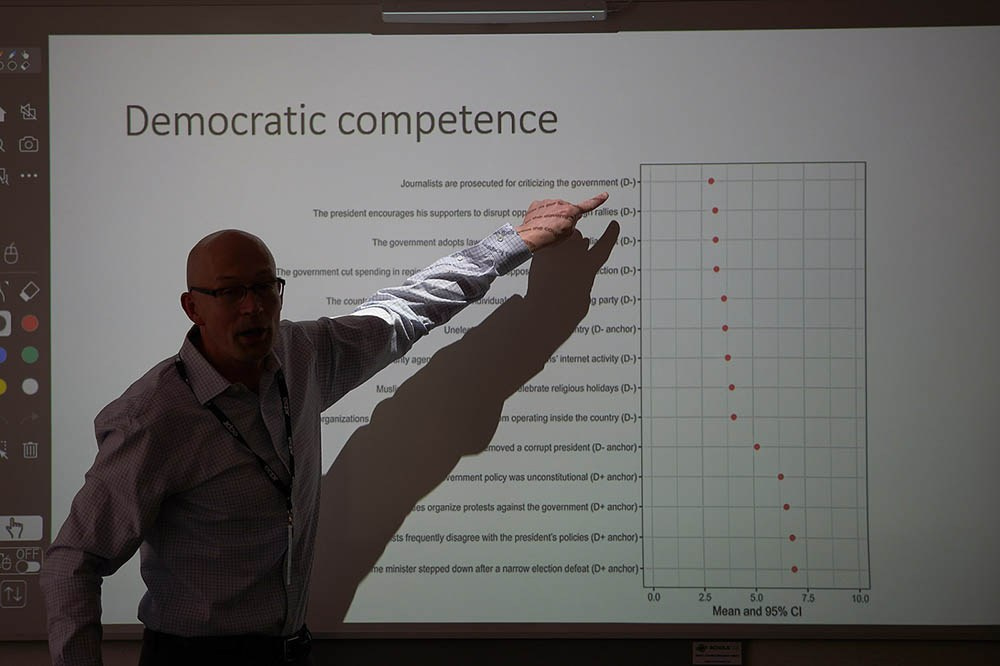 Academic conference speaker at Charles University Prague — education event photography