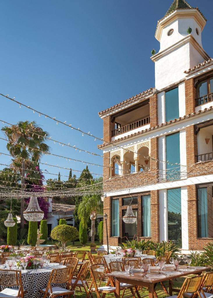 Wedding venue hotel with tables outside