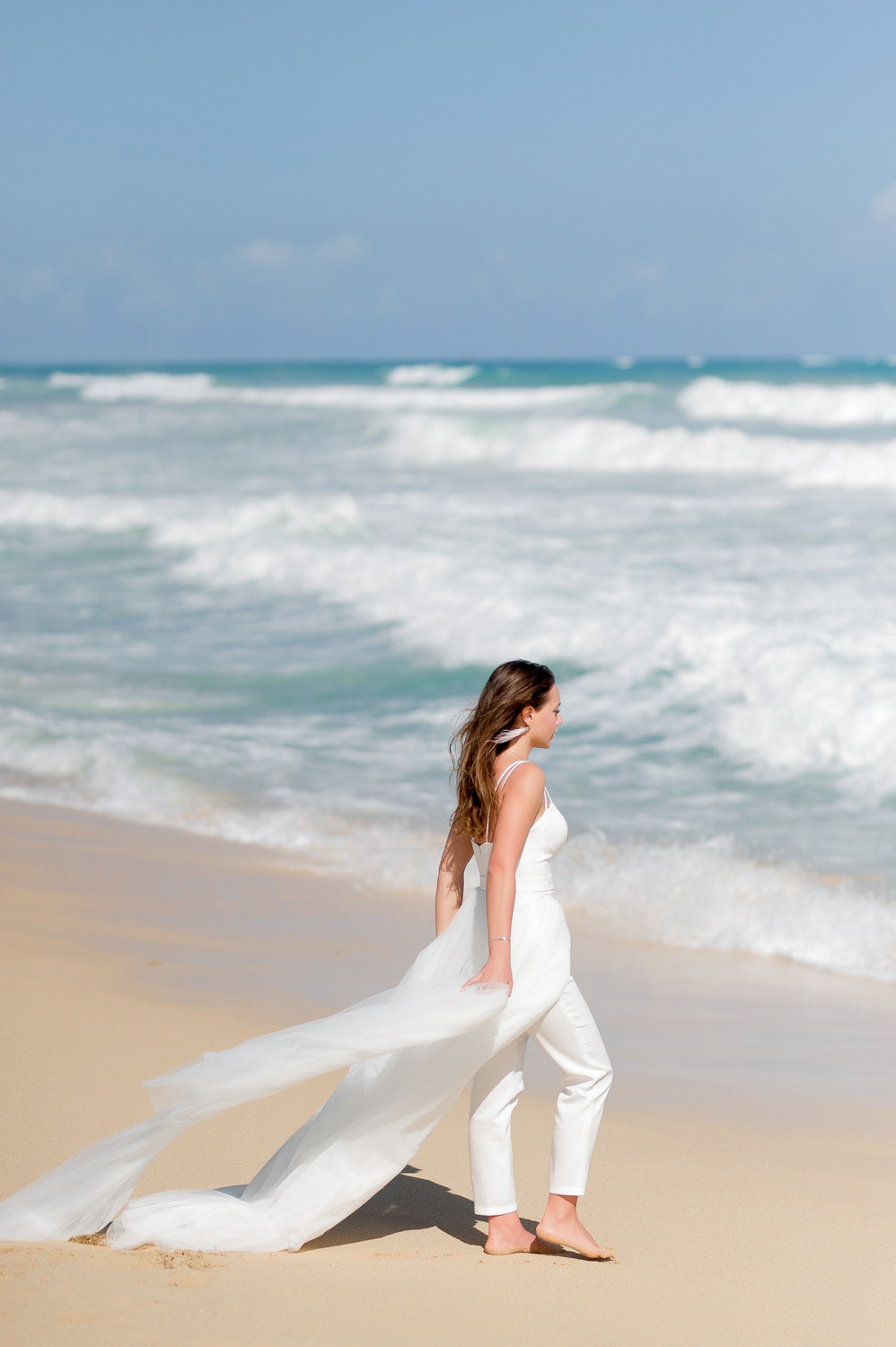 Bride on the background of the sea.