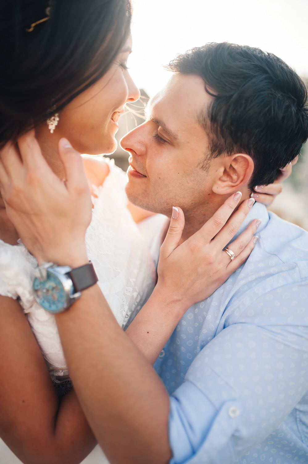 Faces of the bride and groom.